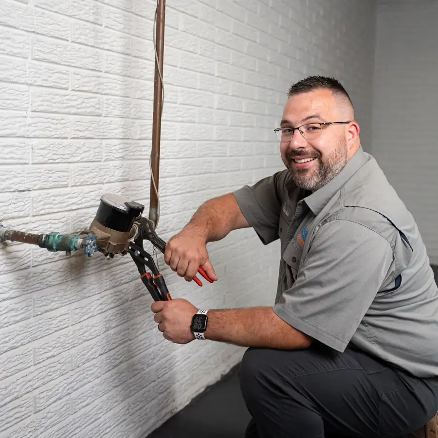 Plumber working on a gasline